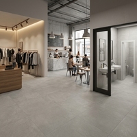 Carreaux de sol en porcelaine au design minimaliste 600x600mm beige, gris, marron, finition mate pour magasin de vêtements et salle d'exposition