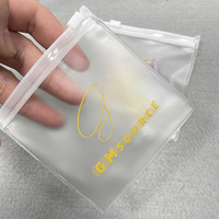 Logo personnalisé PVC givré anneau collier boucle d'oreille stockage bijoux Ziplcok pochette en PVC petit givré en plastique fermeture éclair sacs d'emballage
