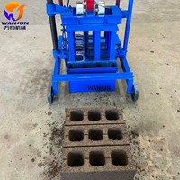Machine de production de blocs de béton et de briques creuses en ciment manuelle QT2-45A durable et à haute efficacité pour matériaux de construction mobiles