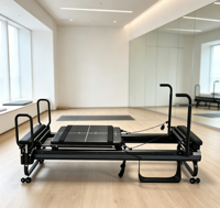 Matériel de fitness de luxe durable et réglable pour studio de yoga, lit de Pilates Reformer, équipement fonctionnel et peu encombrant