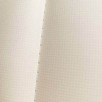 Cahier d'exercices à grille cousu à points de couture, fourni par l'usine, pour les étudiants du Ghana, du Nigéria et d'Afrique de l'Ouest