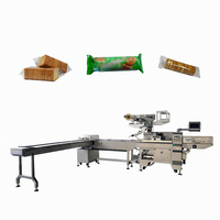 Machine d'emballage de type oreiller pour la production de biscuits, pains, gâteaux, nouilles instantanées et autres snacks en ligne de production