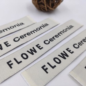 Etiquetas de cuidado de letras de etiqueta de corte recto personalizadas de fábrica para etiquetas tejidas de Camiseta 100% algodón para ropa de alta densidad - Product Image 1