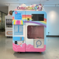 Machine à vendre des barbes à papa neuve, avec bras robotique Datang, capacité de 10 à 18 litres, garantie d'un an, alimentation par prise secteur, service en ligne 24h/24 et 7j/7