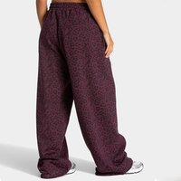 Pantalon de jogging large personnalisé avec étiquette imprimée et passepoil léopard noir, en coton respirant pour femme