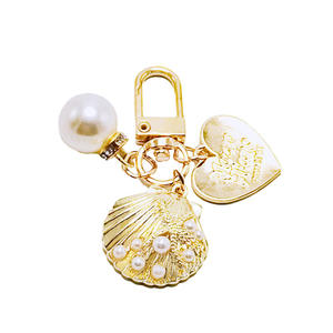Mignon Perle Shell AirPods Pendentif Créatif Petit Porte-clés En Métal En Gros Ins Métal Bijoux Alliage Décapsuleur Idée Cadeau - Product Image 6