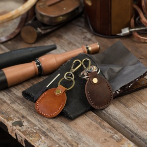 ซองใส่กุญแจหนังแท้แบบวินเทจ ป้องกันการตกหล่น พร้อมอุปกรณ์ติดตาม  ห่วงคล้องกุญแจแบบพกพา  ฝาครอบป้องกัน - Product Image 5