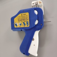 Machine d'étiquettes de personnalisation Booster Avery Dennison pour les machines de pistolet d'étiquettes de boucle de vêtements une machine à broches de boucle Etiqueter