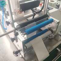 Petit applicateur d'étiquettes vertical Machine d'étiquetage semi-automatique pour grandes bouteilles rondes Machine à étiqueter pour la cuisson des olives d'hôtel Compte-gouttes d'huile essentielle