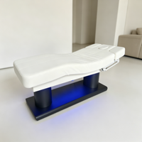 Lit de beauté et table de massage électrique de luxe à 4 moteurs pour salons de beauté, en cuir noir, pour soins du visage et extensions de cils