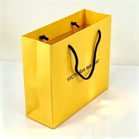 Fournisseur de sacs en papier jaunes pour cosmétiques, emballages cadeaux, mode, maquillage, parfums, design boutique de luxe, sur mesure