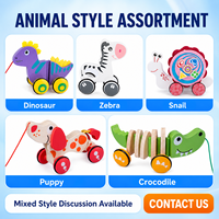 Collection de jouets à tirer en bois pour enfants avec des modèles dinosaure, zèbre, escargot, chiot et crocodile