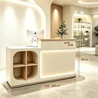 Comptoir de réception style crème pour influenceurs, mini-bar en bois simple, comptoir de caisse moderne et élégant pour magasin de vêtements pour femmes