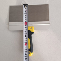 Grattoir industriel de haute qualité en acier inoxydable robuste avec poignée souple en TPR pour racler la peinture sur bois et sols