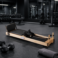 Matériel de sport commercial de luxe personnalisé pour la maison : Reformer Pilates en bois de chêne, pliable, pour le renforcement du tronc