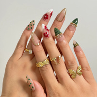 Ongles à presser verts foncés, peints à la main à la française, motif fleur rouge, forme amande, strass verts, perles dorées, bordure métallique, personnalisables CE