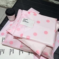 Sacs à poignée découpée en plastique personnalisés avec logo autocollant, très demandés pour les marques de vêtements et les entreprises