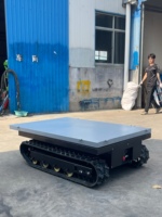 Véhicule chenillé télécommandé à déchargement automatique pour le transport de marchandises tout-terrain et agricole