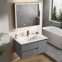 Meuble-lavabo de salle de bain moderne en aluminium inoxydable finition chromée avec miroir LED intégré et vasque en céramique pour petite salle de bain