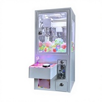 Mini machine à griffes à monnayeur économique pour la Malaisie, type grue à jouets, en métal trempé, vente en gros usine