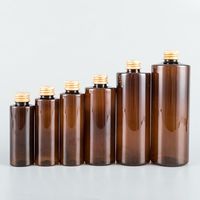 Braune PET-Kunststoff 100ml 150ml 250ml 500ml Nachfüllbare Hautpflege-Tonerflasche mit Gold- oder Silber-Aluminiumoxid-Verschluss