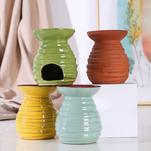 Lámpara de <span class=keywords><strong>Perfume</strong></span> de mesa, venta al por mayor, quemador perfumado colorido, vela de cerámica, cera de aceite, calentador de fusión, linterna, quemador de aceite esencial de terracota - Product Image 1