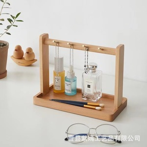 Estante de madera para guardar joyas con ganchos para organizar el escritorio y exhibir cosméticos - Product Image 1