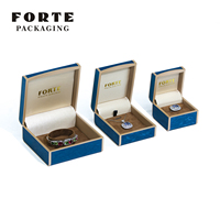 Boîte à bijoux en cuir PU bleu foncé, bord rond, cadre en plastique, logo personnalisé, design moderne pour emballage cadeau, vente en gros