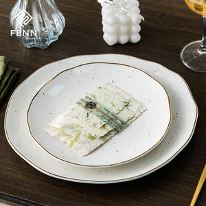 Set Perlengkapan Makan Keramik FENN Custom, Desain Modern Mewah dengan Pinggiran Emas dan Motif Bintik, Piring Makan Keramik Putih dalam Set Porselen untuk Pernikahan - Product Image 1