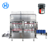 Machine de remplissage automatique de fûts à 4 têtes pour huile lubrifiante, avec pesage par gravité et bouchage