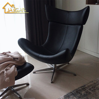 Chaises de salon super confortables, fauteuil pivotant en cuir, fauteuil occasionnel Boconcept Imola bleu
