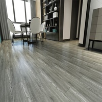 Planche de vinyle en plastique imperméable à l'eau à bas prix 1.5mm 2mm 2.5mm 3mm 5mm carreaux de PVC de luxe revêtement de sol auto-adhésif pour la maison