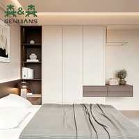 Armoire murale intégrée modulaire personnalisée avec module de tiroirs cantilever et éclairage LED d'ambiance
