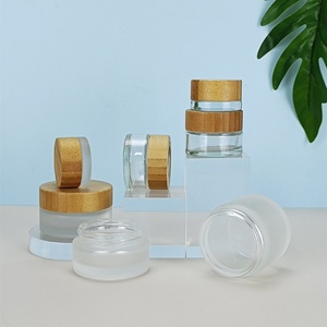 High Quality 100g 50g 30g Skincare <b>Empty</b> Body Cream <b>Jar</b> Cosmetic 3.5oz Glass <b>Jar</b> with Bamboo Lid - Product Image 1