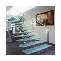 Escalier flottant minimaliste pour villa intérieure en acier inoxydable sans cadre avec rampe en verre trempé – Solution personnalisée
