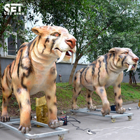 Modèle d'animal sauvage réaliste en taille réelle, tigre à dents de sabre animatronique personnalisé OEM pour la décoration des parcs d'attractions et des zoos