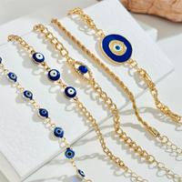 Conjunto de brazalete de ojos malvados azules de estilo exagerado bohemio, pulsera de perlas chapada en oro para mujer, joyería de moda