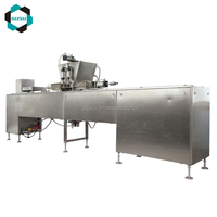 Ligne de production de chocolat GUSU avec déposeur et formateur de grappes, alimentation quantitative automatique