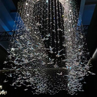Lustre long en spirale papillon de conception italienne, décoration en cristal K9, luminaire de luxe en cristal pour villa duplex