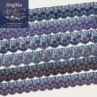 Dentelle florale brodée multicolore avec des fleurs 3D, des paillettes, un bord ondulé, organza de luxe 100% polyester