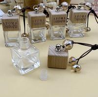 Bouteille suspendue de parfum de voiture en verre vide 8ml diffuseur de désodorisant en verre transparent carré pour huiles essentielles de voiture avec couvercle en bois
