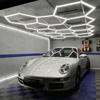 Lumière LED en forme de nid d'abeille hexagonal OEM ODM, luminaire de plafond personnalisé pour atelier, salle de sport, salon de coiffure, garage