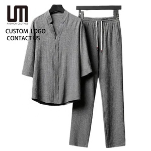 Liu Ming moda Vintage all'ingrosso <span class=keywords><strong>estate</strong></span> <span class=keywords><strong>abbigliamento</strong></span> da <span class=keywords><strong>uomo</strong></span> <span class=keywords><strong>Casual</strong></span> due pezzi cotone poliestere camicia top e pantaloni - Product Image 1