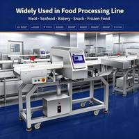 Machine automatique de détection des métaux dans les aliments. avec commande par écran tactile et système de rejet par poussoir pour ligne d'emballage