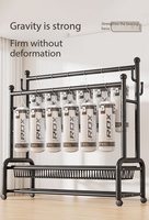 Porte-vêtements double à roulettes - Porte-vêtements moderne en métal avec rangement double couche pour chambre, salon et cuisine