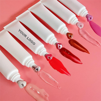 Vente en gros de gloss à lèvres vegan personnalisé en 21 couleurs, label privé, baume à lèvres minéral hydratant, gloss à lèvres vegan brillant, fournisseur de gloss à lèvres vegan