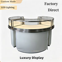 Vitrine de présentation de bijoux incurvée en forme de C sur mesure, comptoir rond pour bijoux avec éclairage LED, armoire sur mesure en acier inoxydable doré