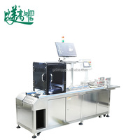 Machine de marquage laser UV automatique pour les emballages alimentaires, les cartons, les boîtes en papier - Imprime la date, le logo, le code QR avec inspection