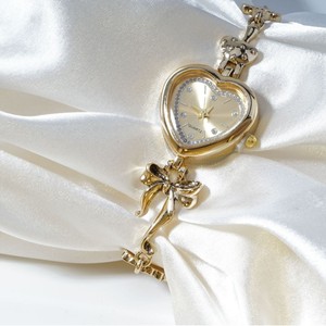 国境を越えた爆発的な人気！ヴィンテージ風ハート合金クォーツポインターブレスレットウォッチ、ゴールデンボウフラワーファッションレディースウォッチ - Product Image 4