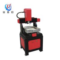 Mini machine CNC à cadre en fonte de fer robuste avec axe rotatif bois Mdf contreplaqué acrylique routeur CNC de bureau 4040 pour les entreprises